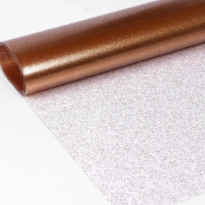 Klar plast med gullglitter – Gjennomsiktig voksduk med gullstøv